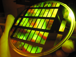 Inspection of a hot-embossing stamp with sub-micron feature arrays